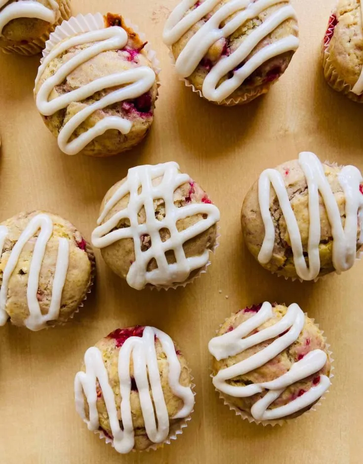 vegan raspberry muffins with vegan cream cheese topping