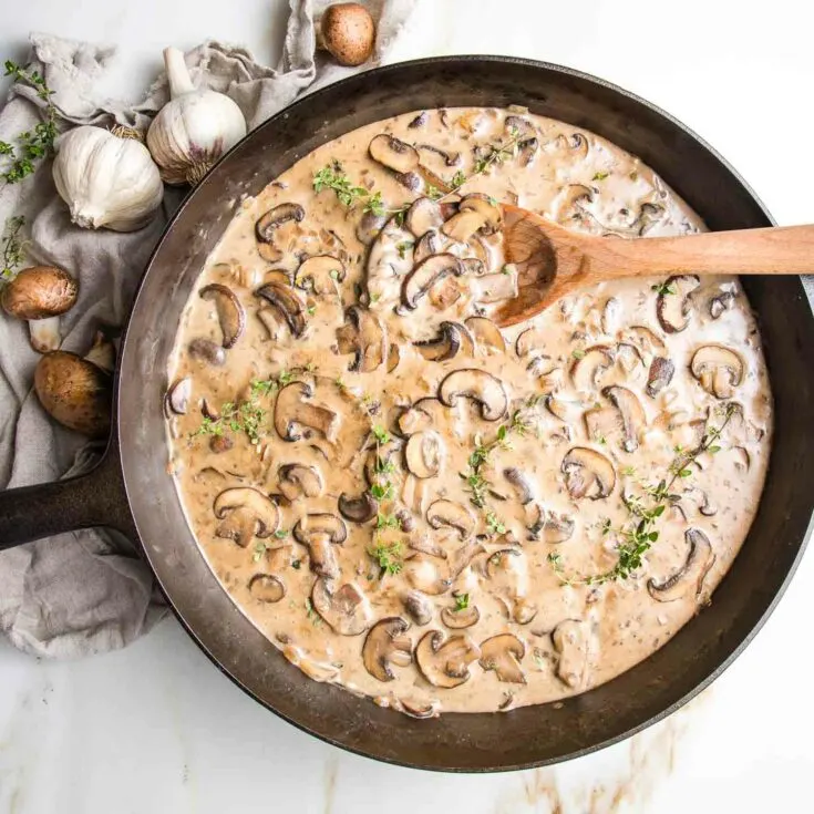 Vegan mushroom cream sauce in a skillet.