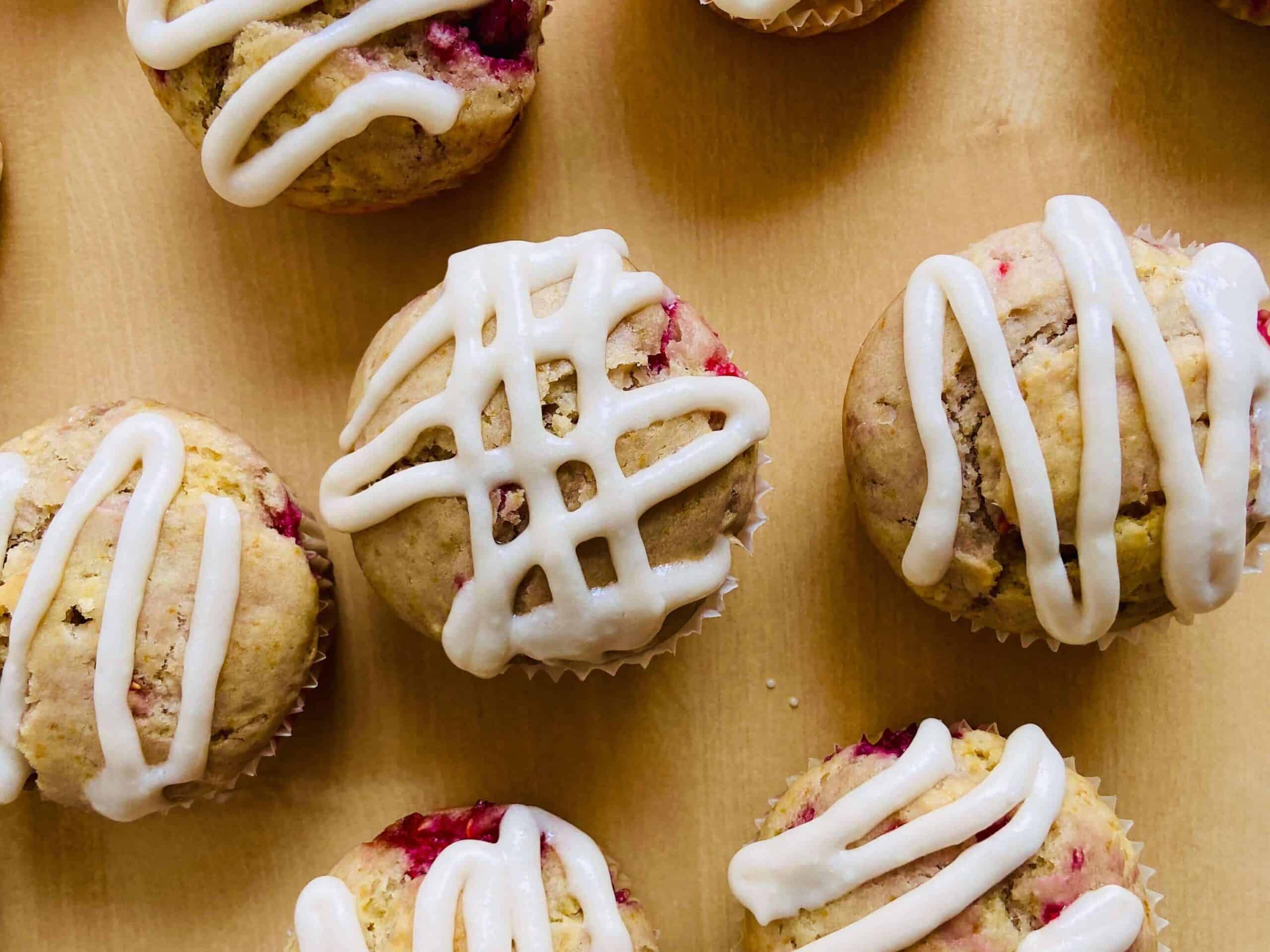 vegan raspberry muffins with vegan cream cheese topping